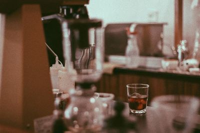 Close-up of wine bottles on table