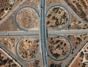 Aerial view of roads amidst field