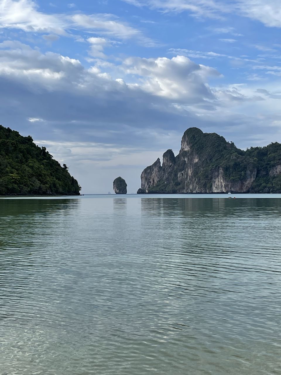 water, nature, cloud, reflection, scenics - nature, day, sea, beauty in nature, blue, sky, no people, outdoors, mountain, travel, architecture, motion, terrain, land, coast, cliff, built structure, environment, wave, beach, sunlight, transportation, travel destinations