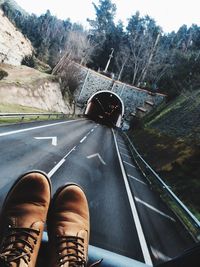 Cropped image of car on road