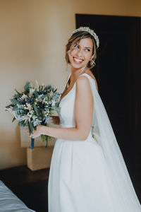 Portrait of smiling young woman