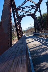Metal bridge against sky