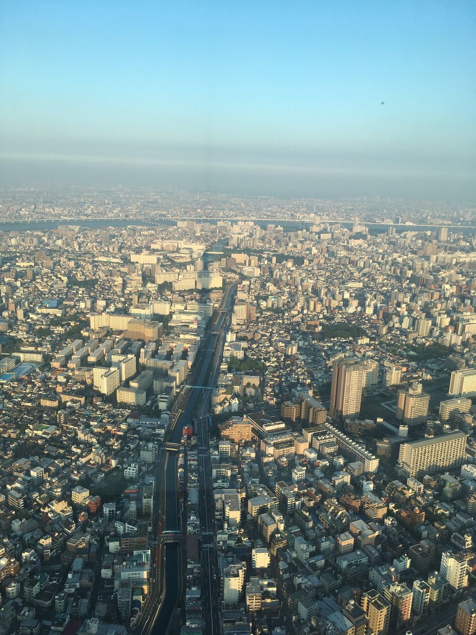 cityscape, city, architecture, building exterior, built structure, building, crowd, nature, sky, crowded, residential district, clear sky, day, aerial view, high angle view, outdoors, horizon, modern, office building exterior, skyscraper