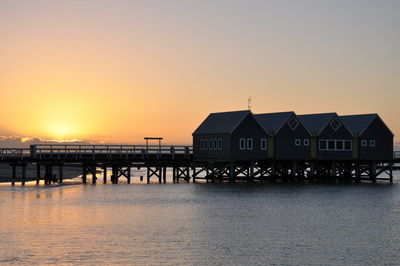 Scenic view of sea against orange sky