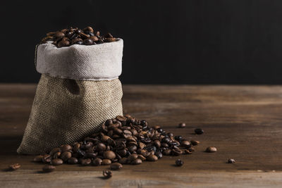 Close-up of coffee beans on table