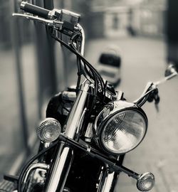 Close-up of bicycle parked on street