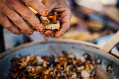 Close-up of person preparing food