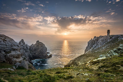 Scenic view of sea against sky during sunset