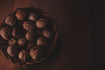 Directly above shot of fruits in basket on table