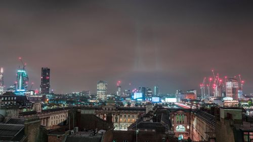 View of city lit up at night