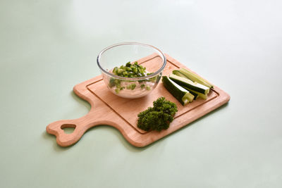 High angle view of food on table against white background