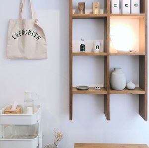 Clothes hanging on white wall at home