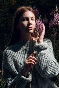 Young woman looking at camera