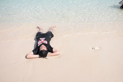 High angle view of woman at beach