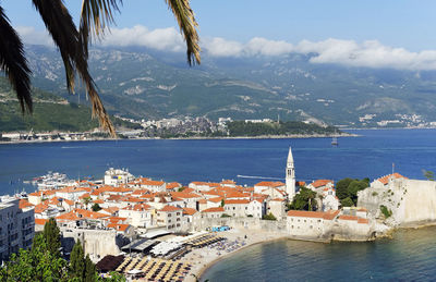 High angle view of town by sea