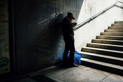 Man walking on staircase