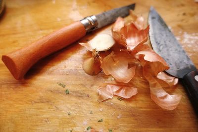 Close-up of knife on cutting board