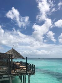 Pier over sea against sky