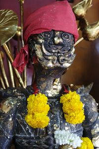 Close-up of buddha statue in temple