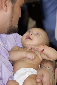 Midsection of couple with hands