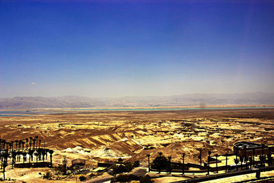 Aerial view of town against clear sky