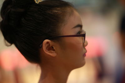 Close-up of girl looking away