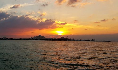 Scenic view of sea against sky during sunset