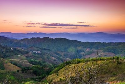 Scenic view of landscape against sky during sunset