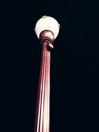 Low angle view of illuminated lamp