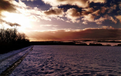 Scenic view of land during sunset