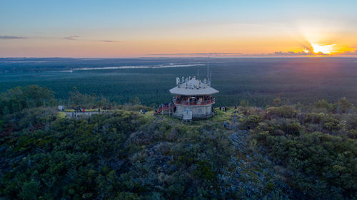 Scenic view of landscape against sky during sunset