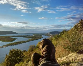 Low section of man wearing shoes