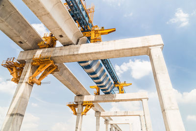 Low angle view of construction site against sky