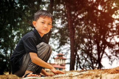 Portrait of boy in sunlight