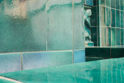 Close-up of horse statue by water