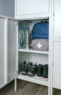 View of bottles on shelf at home