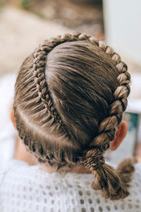 High angle view of girl with hairstyle
