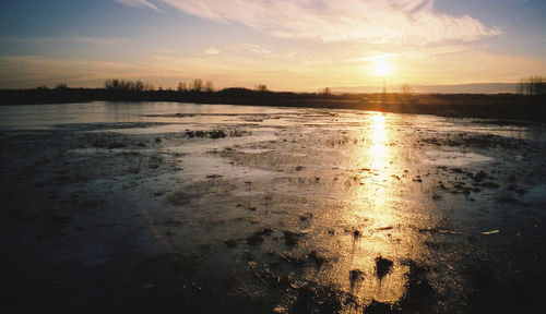 Scenic view of sea at sunset