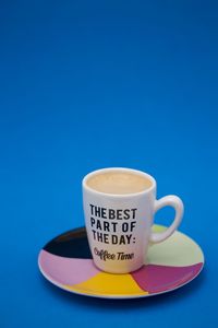 Close-up of coffee cup on table