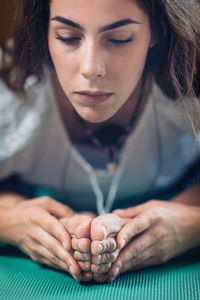 Close-up of woman with hands