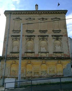 Low angle view of historic building against sky