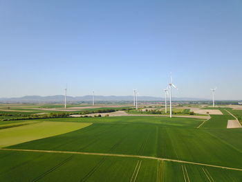 Scenic view of farm against sky