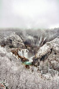 Aerial view of snow covered land