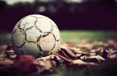 Close-up of soccer ball on field
