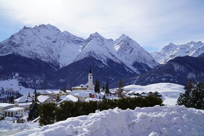 Scenic view of snowcapped mountains against sky