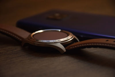 Close-up of black coffee cup on table