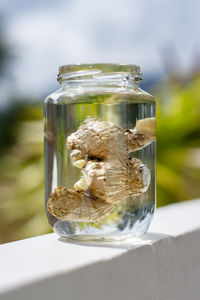 Close-up of glass jar on table