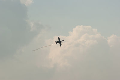 Low angle view of airplane against sky