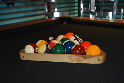 Close-up of multi colored water on table