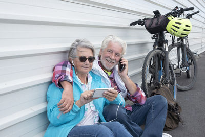 Friends sitting on mobile phone